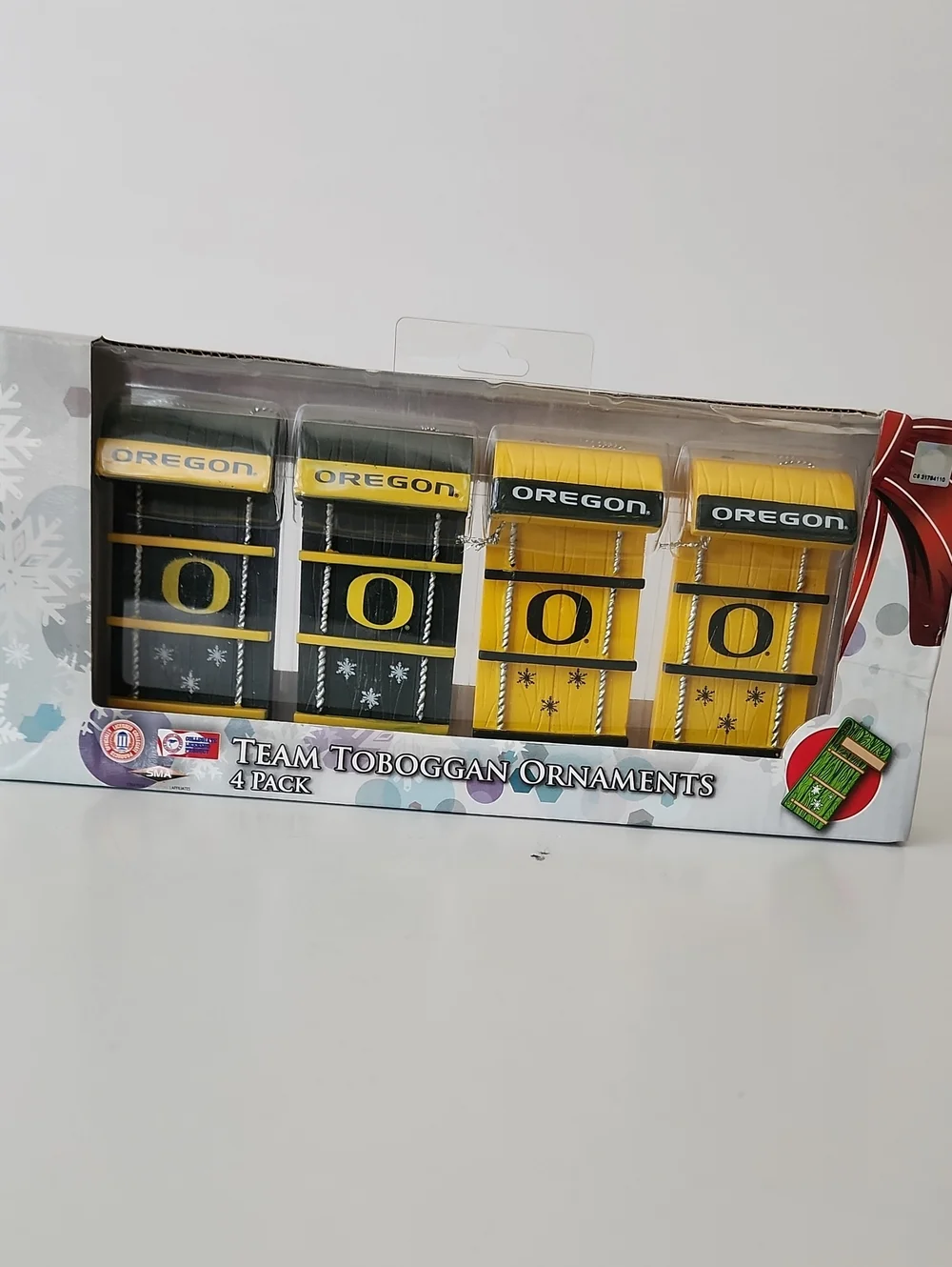 Forever Collectibles Oregon Team Toboggan Ornaments - Green and Yellow 4-Pack